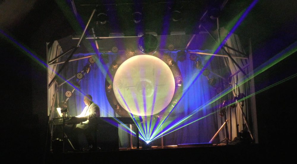 Time — laser effects around the circular projection screen
